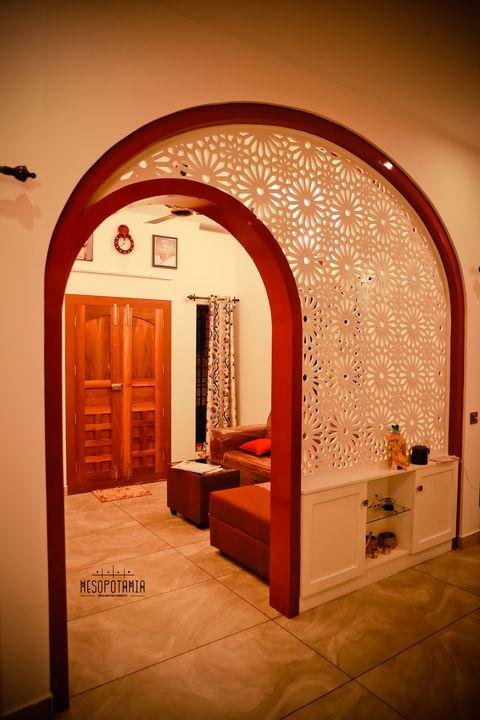 An arch and a cut screen opening a passage
