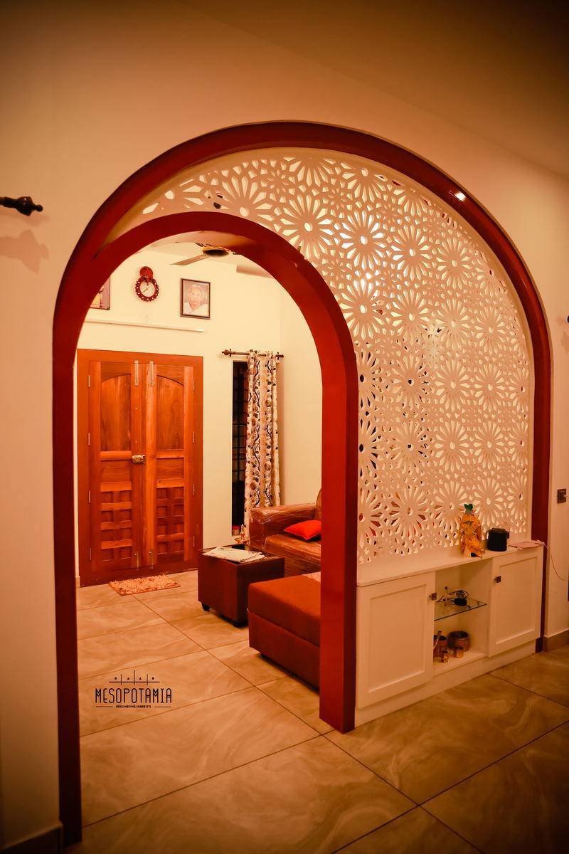 An arch and a cut screen where a door would normally close the passage.