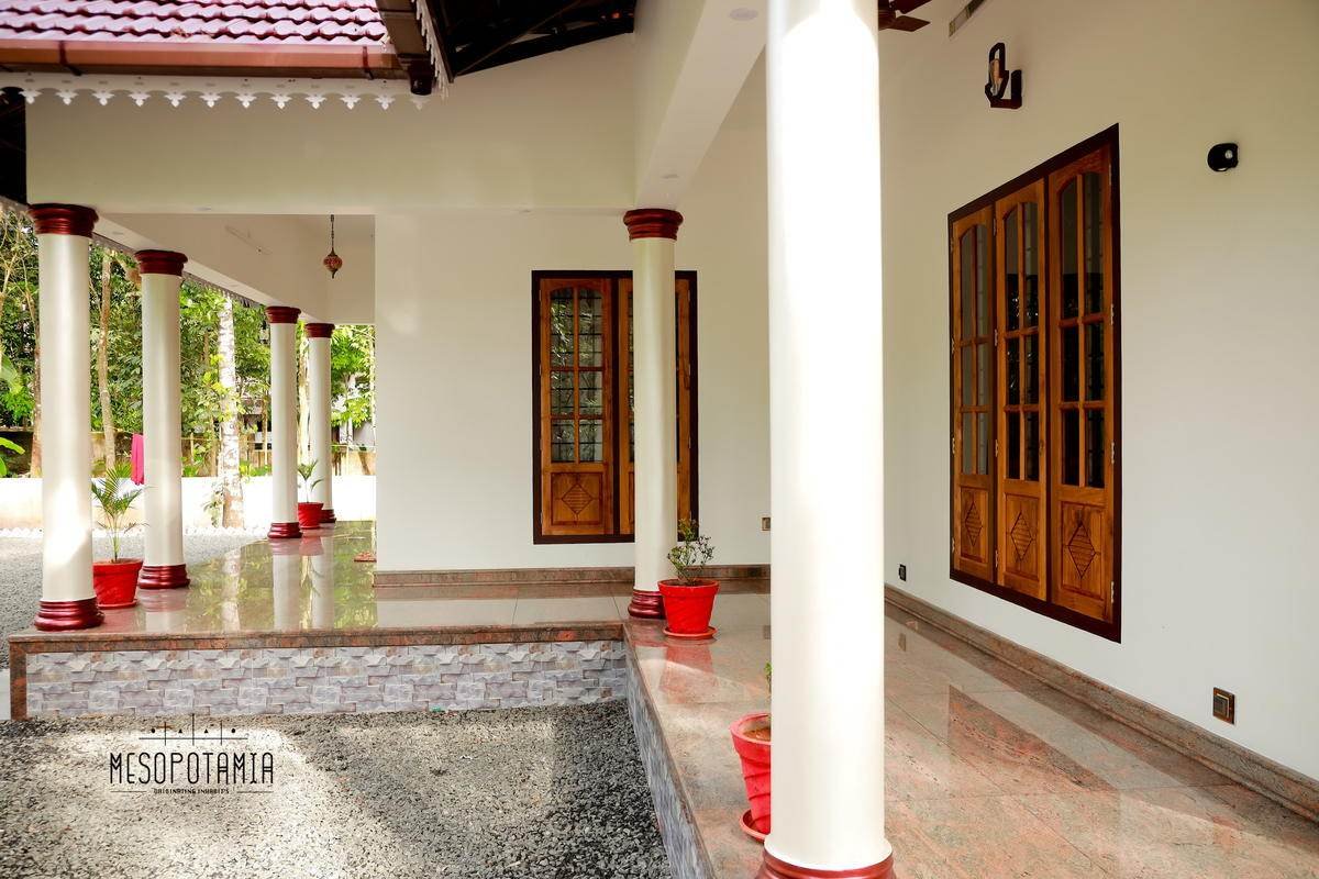 A deep verandah carried on turned columns