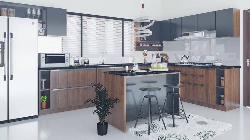 Living, dining and kitchen held in a single volume under exposed rafters.