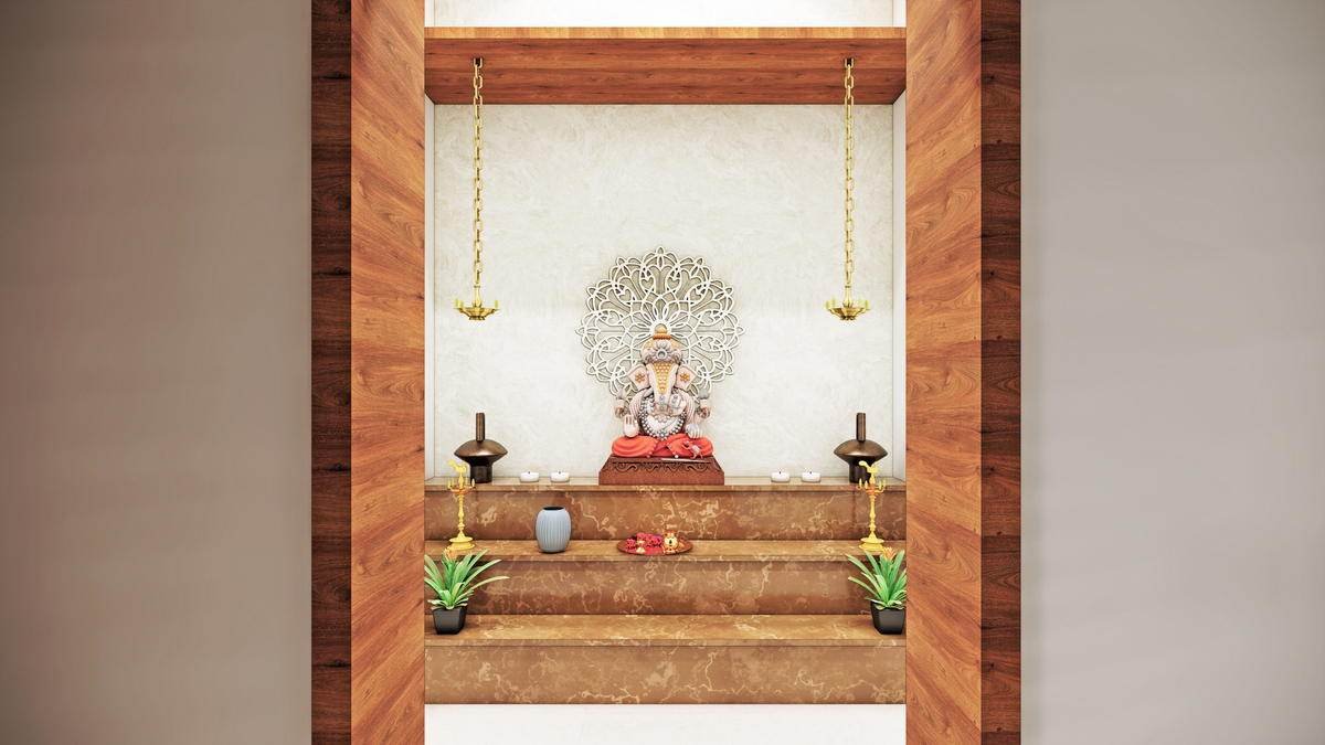 A prayer niche set into its own recess and lit from above