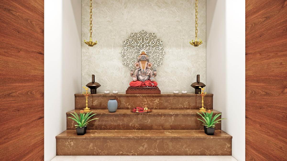 A stone plinth with a cut white screen above it