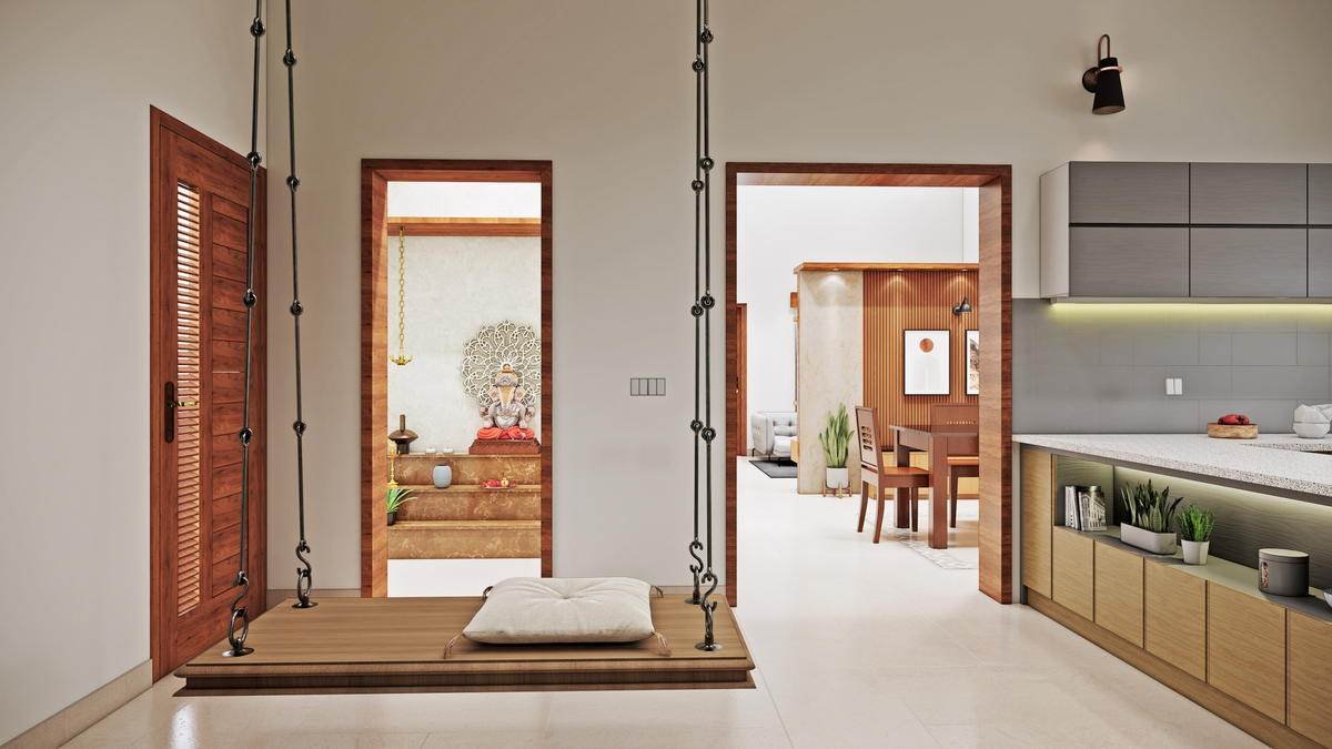 A timber swing hung on chains between two rooms
