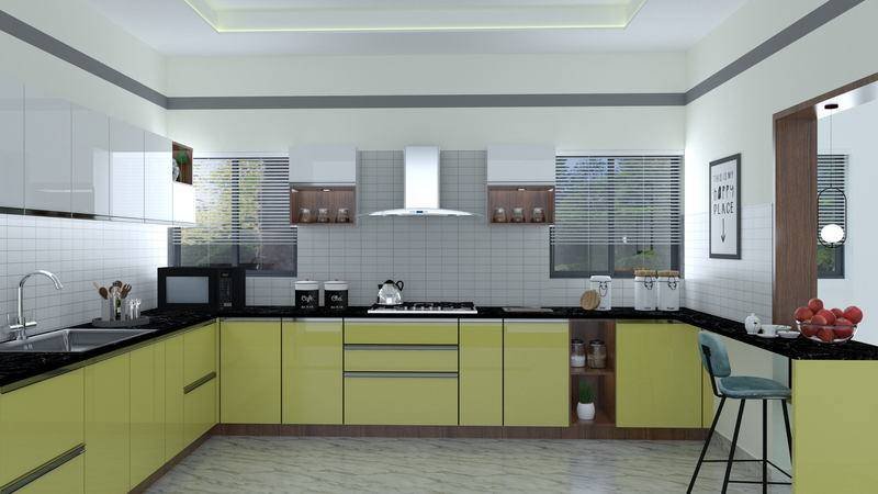 A kitchen in olive green with a black stone worktop